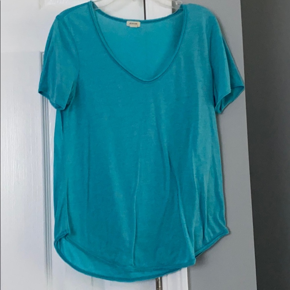Blue short sleeve tee shirt.